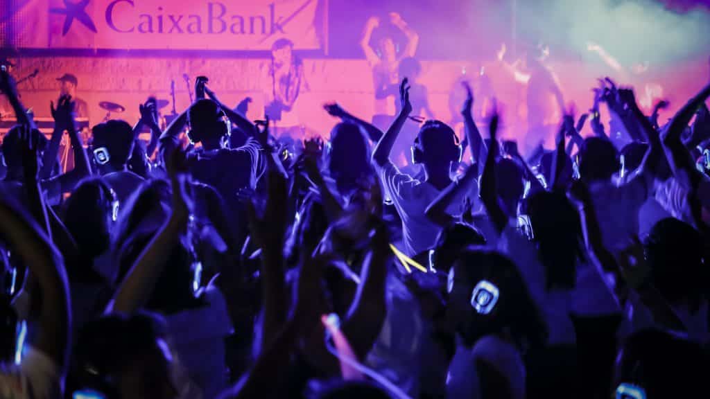 Silent disco dance floor with purple lights