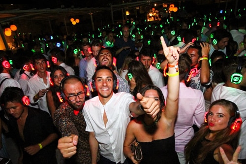 Silent disco party with light-up headphones