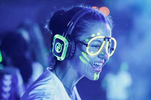 Silent disco party with light-up headphones