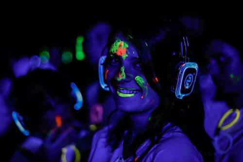 Silent disco party with light-up headphones